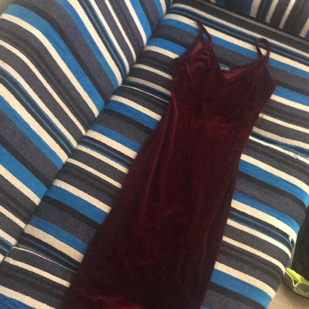 Maroon velvet dress.